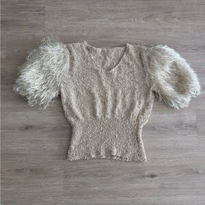 Chic Beige Top with Feathered Sleeves